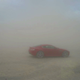 Illustration for article titled Riding Shotgun Through A Sandstorm With iTop Gear/i
